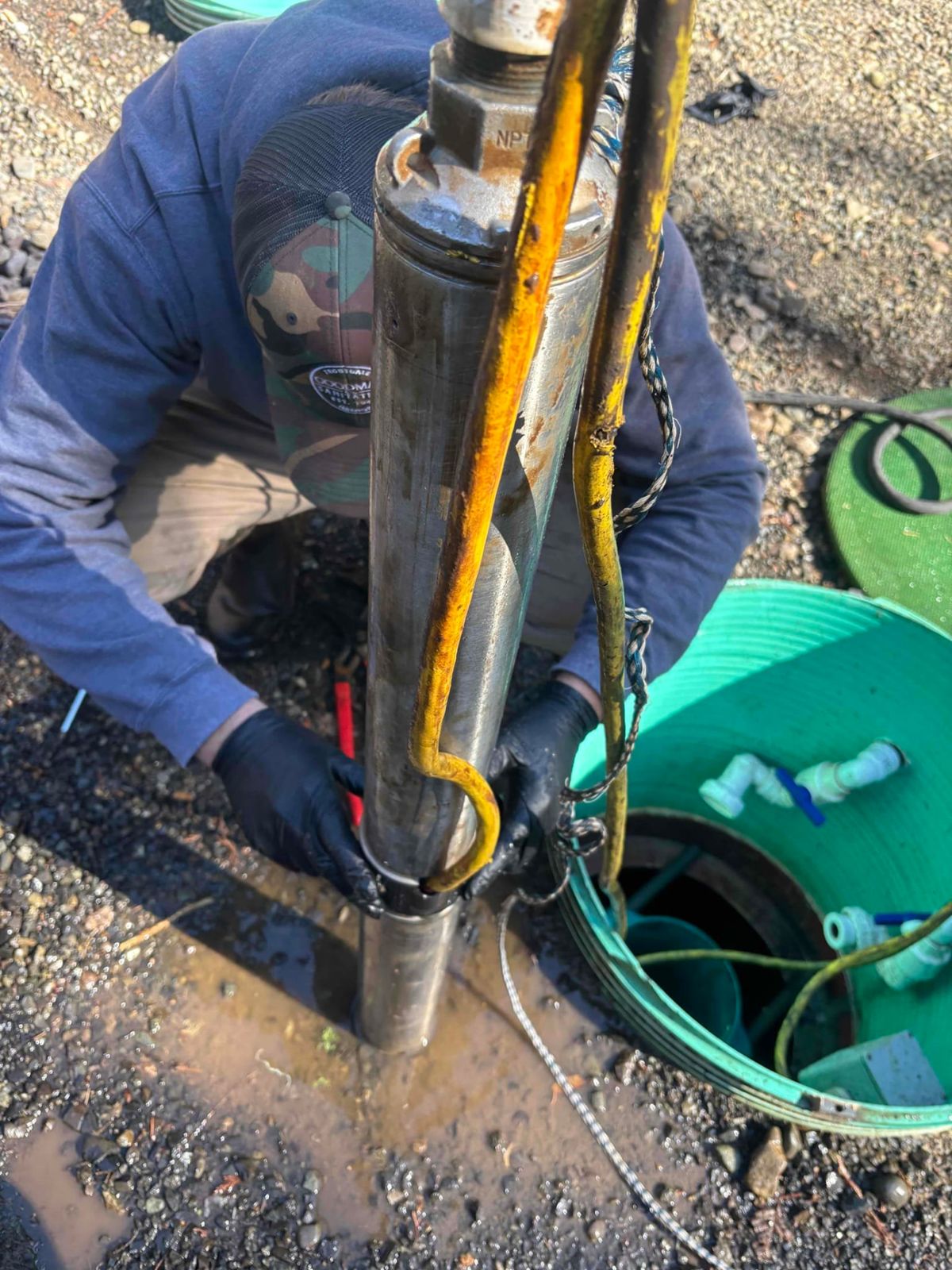 Goodman crew and pump truck on a septic system installation in Gresham, OR